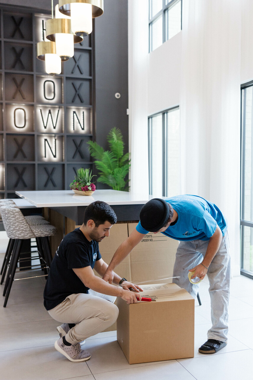 Members of staff conducting a commercial move near me.